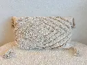 Coussin rectangulaire beige et motif