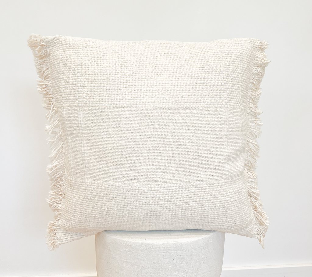 Coussin beige frange