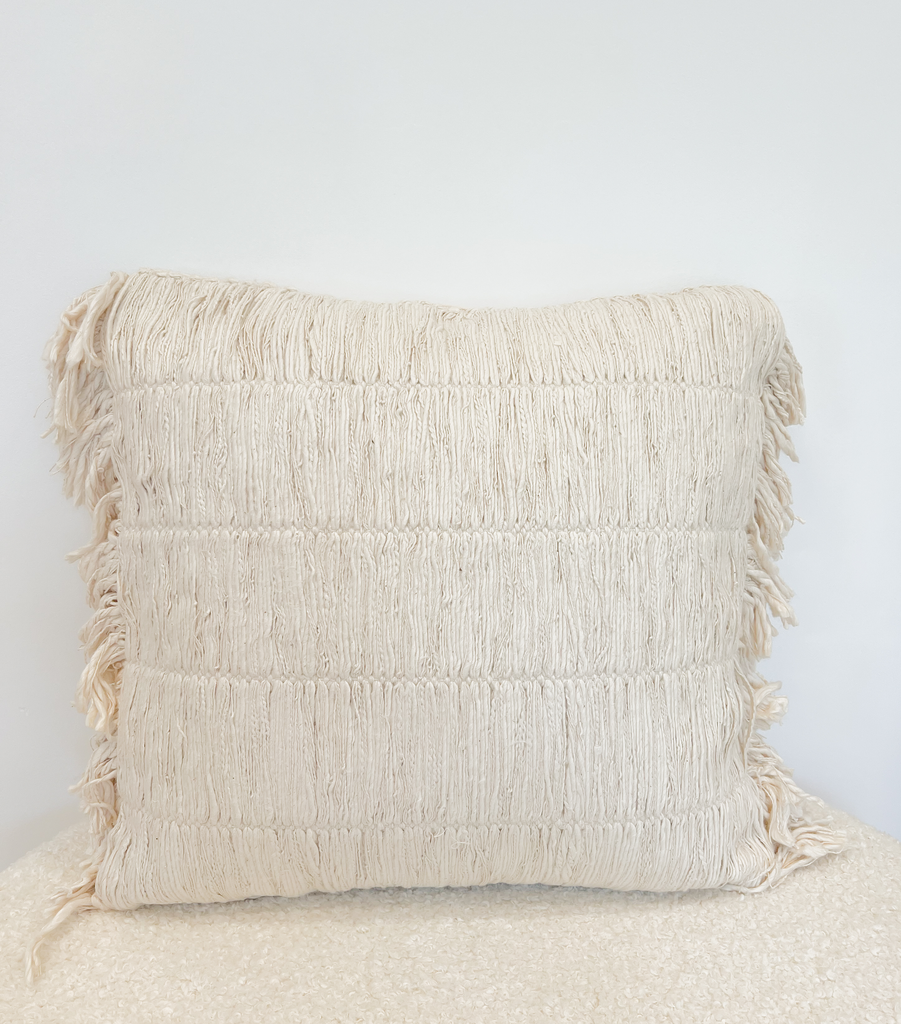 Coussin beige texturé