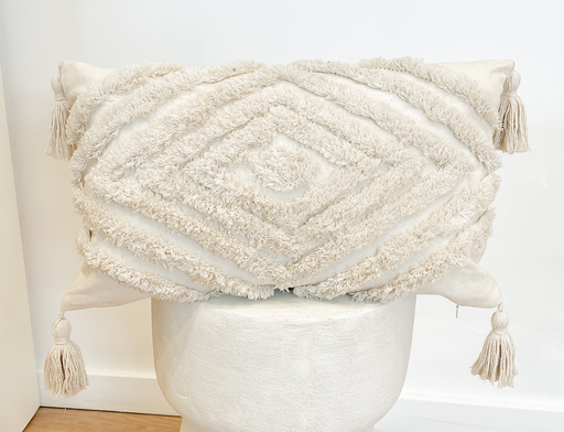 Coussin rectangulaire beige et motif