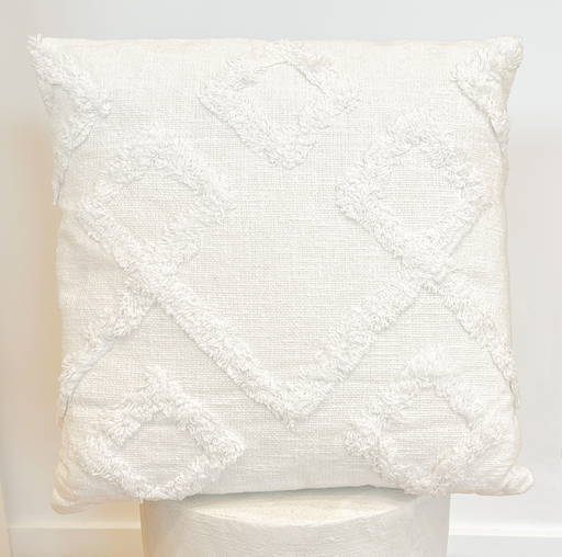 Coussin carré blanc et motif losange