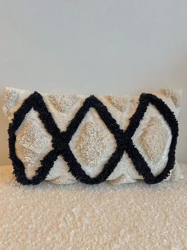 Coussin rectangulaire blanc et noir motif losange