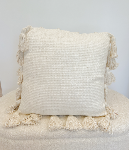 Coussin pompoms beige